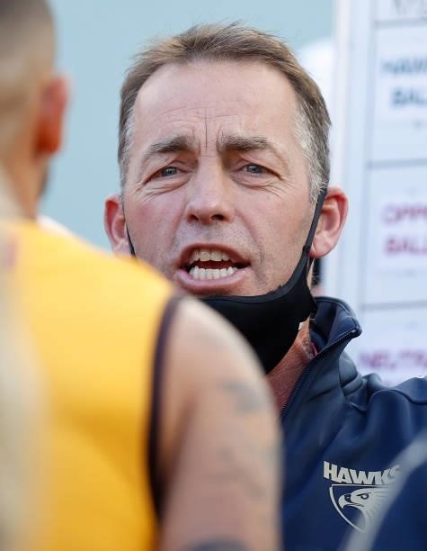 Alastair Clarkson, Senior Coach of the Hawks addresses his players during the 2021 AFL Round 15 match between the GWS Giants and the Hawthorn Hawks...