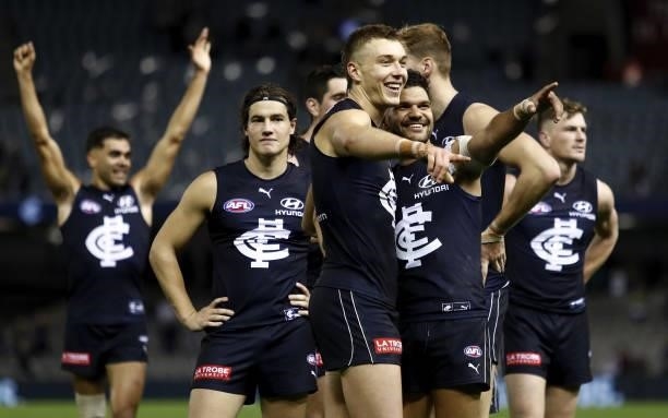 Patrick Cripps and Sam Petrevski-Seton of the Blues celebrate a win during the 2021 AFL Round 15 match between the Carlton Blues and the Adelaide...
