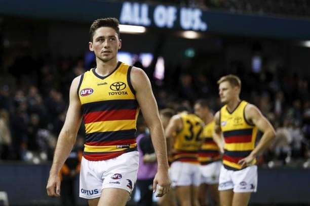 Chayce Jones of the Crows looks dejected after a loss during the 2021 AFL Round 15 match between the Carlton Blues and the Adelaide Crows at Marvel...