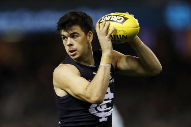 Matthew Kennedy of the Blues marks the ball during the 2021 AFL Round 15 match between the Carlton Blues and the Adelaide Crows at Marvel Stadium on...