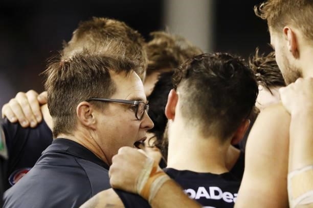 Senior coach David Teague of the Blues addresses his players during the 2021 AFL Round 15 match between the Carlton Blues and the Adelaide Crows at...