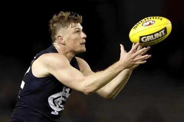 Jack Newnes of the Blues marks the ball during the 2021 AFL Round 15 match between the Carlton Blues and the Adelaide Crows at Marvel Stadium on June...