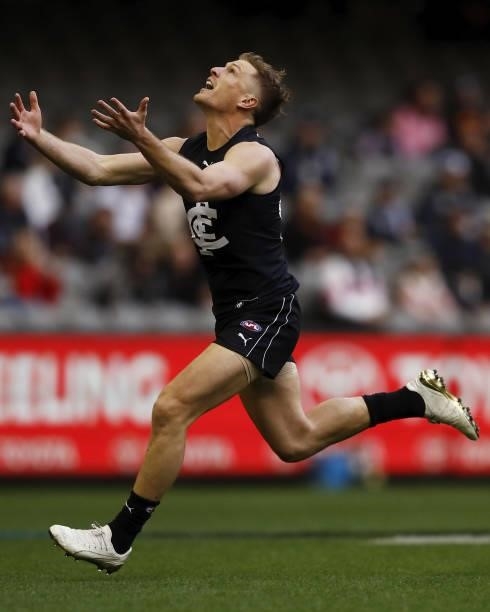 Jack Newnes of the Blues attempts to mark the ball during the 2021 AFL Round 15 match between the Carlton Blues and the Adelaide Crows at Marvel...