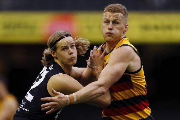 Reilly O'Brien of the Crows and Sam Docherty of the Blues during the 2021 AFL Round 15 match between the Carlton Blues and the Adelaide Crows at...