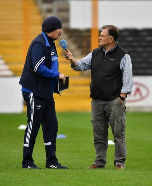 Kilkenny , Ireland - 26 June 2021; Laois manager Seamus Plunkett is interviewed by Martin Kiely, a sports commentator with RTÉ, before the Leinster...