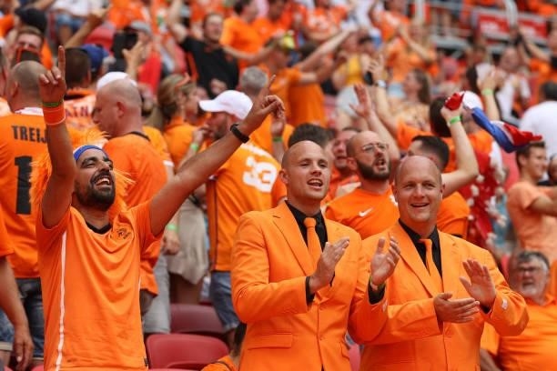 Netherlands' supporters cheer for their team before the UEFA EURO 2020 round of 16 football match between the Netherlands and the Czech Republic at...