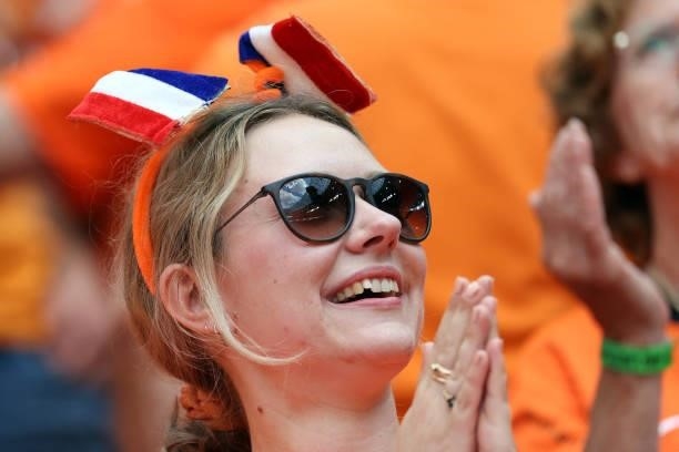 Netherlands' supporter cheers for her team before the UEFA EURO 2020 round of 16 football match between the Netherlands and the Czech Republic at...