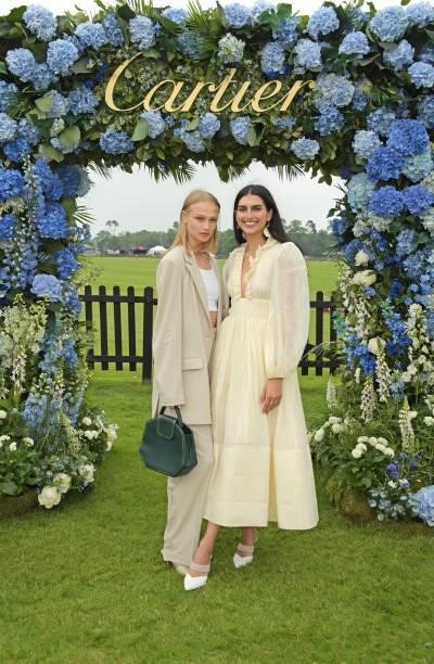 Harriet Longhurst and Saffron Vadher attend the Cartier Queen's Cup Polo 2021 at Guards Polo Club on June 27, 2021 in Egham, England.