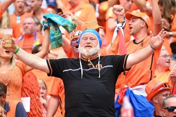 Netherlands supporters cheers before the UEFA EURO 2020 round of 16 football match between the Netherlands and the Czech Republic at Puskas Arena in...