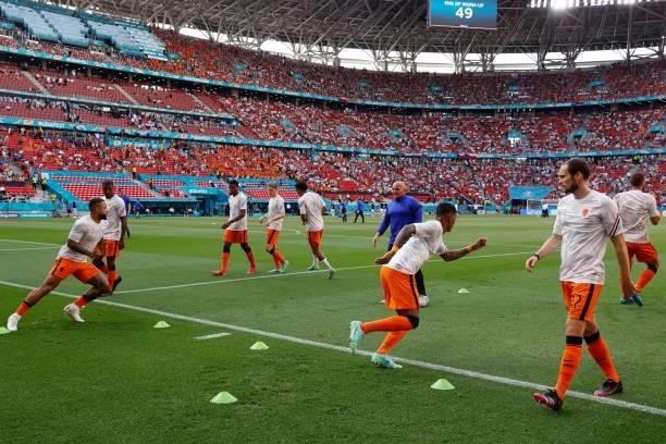 Netherlands' players warm up before the UEFA EURO 2020 round of 16 football match between the Netherlands and the Czech Republic at Puskas Arena in...
