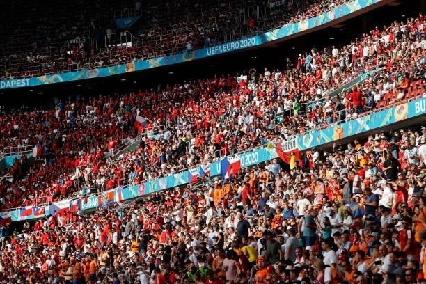 Supporters wait for the start of the UEFA EURO 2020 round of 16 football match between the Netherlands and the Czech Republic at Puskas Arena in...