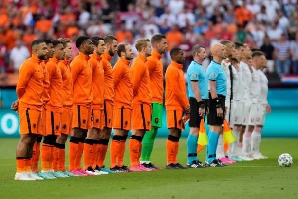Players listen to the national anthems before the UEFA EURO 2020 round of 16 football match between the Netherlands and the Czech Republic at Puskas...