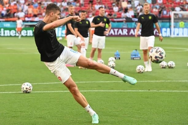 Czech Republic's forward Patrik Schick warms up before the UEFA EURO 2020 round of 16 football match between the Netherlands and the Czech Republic...