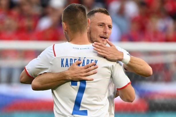 Czech Republic's defender Vladimir Coufal hugs Czech Republic's defender Pavel Kaderabek before the UEFA EURO 2020 round of 16 football match between...