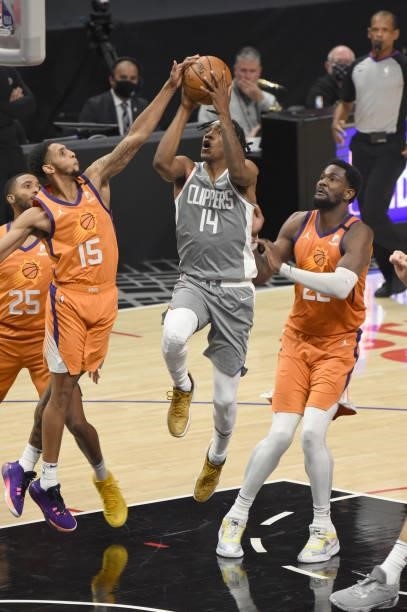 Terance Mann of the LA Clippers drives to the basket against the Phoenix Suns during Game 4 of the Western Conference Finals of the 2021 NBA Playoffs...