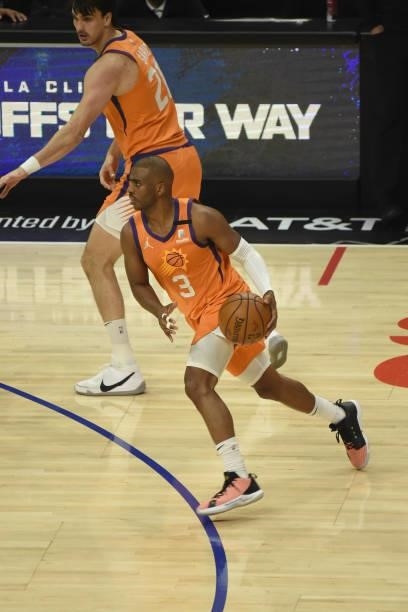 Chris Paul of the Phoenix Suns dribbles the ball against the LA Clippers during Game 4 of the Western Conference Finals of the 2021 NBA Playoffs on...