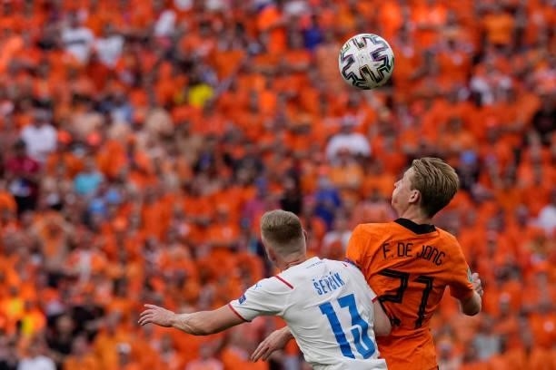 Czech Republic's midfielder Petr Sevcik heads the ball with Netherlands' midfielder Frenkie de Jong during the UEFA EURO 2020 round of 16 football...