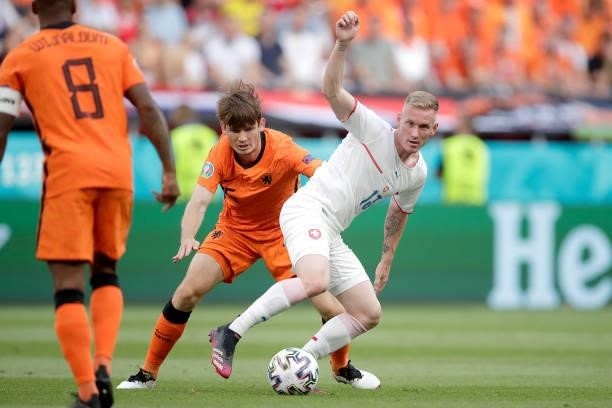 Marten de Roon of Holland, Petr Sevcik of Czech Republic during the EURO match between Holland v Czech Republic at the Puskas Arena on June 27, 2021...