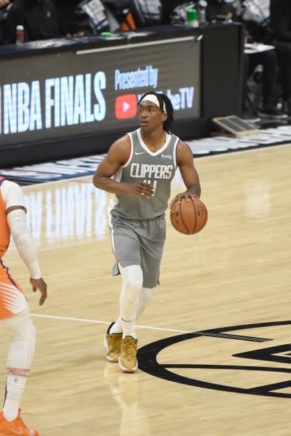 Terance Mann of the LA Clippers dribbles the ball against the Phoenix Suns during Game 4 of the Western Conference Finals of the 2021 NBA Playoffs on...