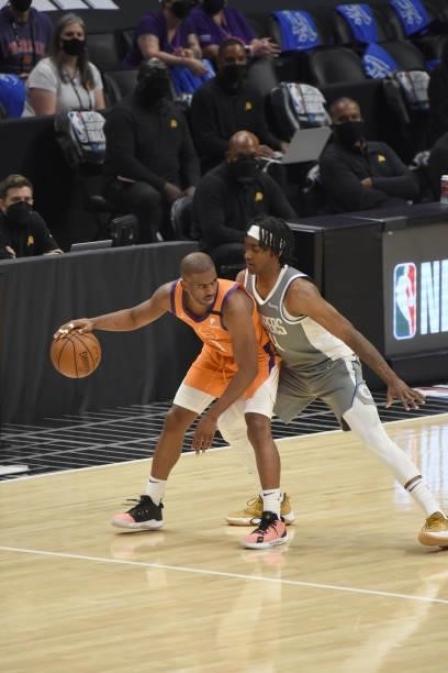 Terance Mann of the LA Clippers plays defense on Chris Paul of the Phoenix Suns during Game 4 of the Western Conference Finals of the 2021 NBA...