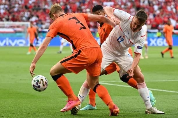 Netherlands' defender Matthijs de Ligt fights for the ball with Czech Republic's midfielder Lukas Masopust during the UEFA EURO 2020 round of 16...