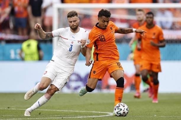 Ondrej elustka of Czech Republic, Donyell Malen of Holland during the UEFA EURO 2020 match between the Netherlands and the Czech Republic at Puskas...
