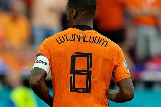 Netherlands' midfielder Georginio Wijnaldum wearing a captain's armband bearing the words "One Love
