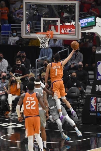 Devin Booker of the Phoenix Suns drives to the basket against the LA Clippers during Game 4 of the Western Conference Finals of the 2021 NBA Playoffs...