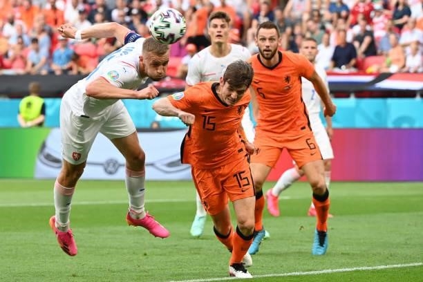 Czech Republic's midfielder Tomas Soucek heads the ball and misses a goal opportunity during the UEFA EURO 2020 round of 16 football match between...