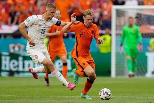 Netherlands' midfielder Frenkie de Jong challenges Czech Republic's midfielder Tomas Soucek during the UEFA EURO 2020 round of 16 football match...