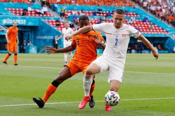Netherlands' midfielder Georginio Wijnaldum challenges Czech Republic's defender Pavel Kaderabek during the UEFA EURO 2020 round of 16 football match...