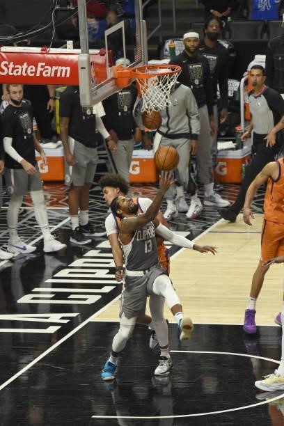 Paul George of the LA Clippers shoots the ball against the Phoenix Suns during Game 4 of the Western Conference Finals of the 2021 NBA Playoffs on...
