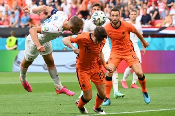 Czech Republic's midfielder Tomas Soucek heads the ball and misses a goal opportunity during the UEFA EURO 2020 round of 16 football match between...