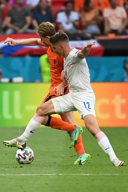 Czech Republic's midfielder Lukas Masopust fights for the ball with Netherlands' defender Matthijs de Ligt during the UEFA EURO 2020 round of 16...