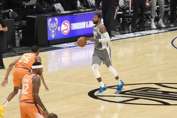 Paul George of the LA Clippers dribbles the ball against the Phoenix Suns during Game 4 of the Western Conference Finals of the 2021 NBA Playoffs on...