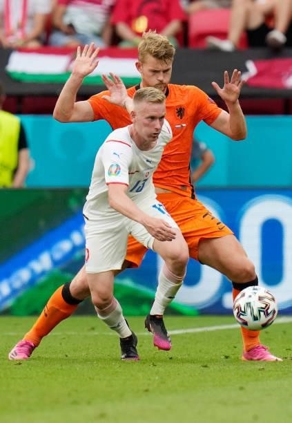 Czech Republic's midfielder Petr Sevcik challenges Netherlands' defender Matthijs de Ligt during the UEFA EURO 2020 round of 16 football match...
