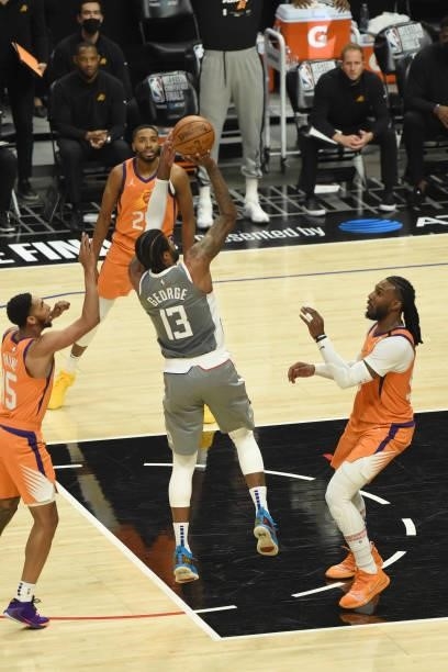 Paul George of the LA Clippers shoots the ball against the Phoenix Suns during Game 4 of the Western Conference Finals of the 2021 NBA Playoffs on...