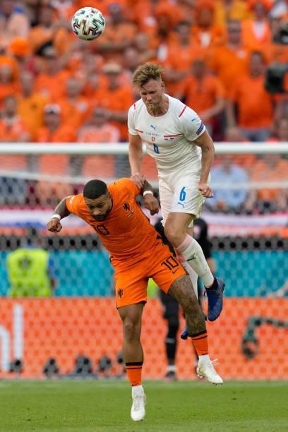 Czech Republic's defender Tomas Kalas heads the ball with Netherlands' forward Memphis Depay during the UEFA EURO 2020 round of 16 football match...
