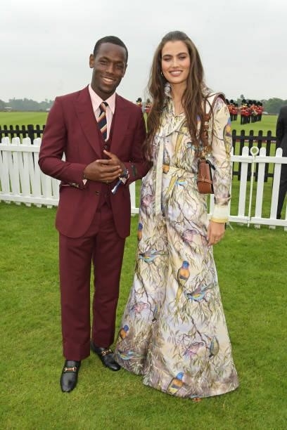 Micheal Ward and Alana Felisberto attend the Cartier Queen's Cup Polo 2021 at Guards Polo Club on June 27, 2021 in Egham, England.