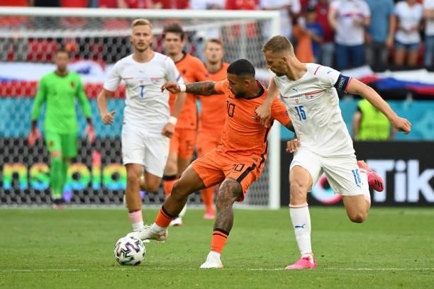 Netherlands' forward Memphis Depay fights for the ball with Czech Republic's midfielder Tomas Soucek during the UEFA EURO 2020 round of 16 football...