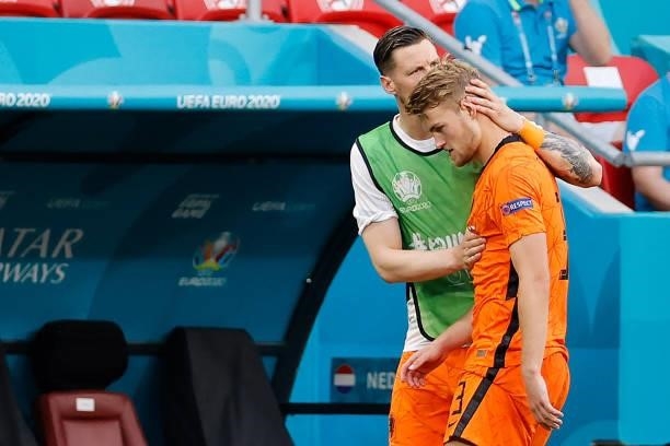 Netherlands' defender Matthijs de Ligt walks off the pitch after a red card during the UEFA EURO 2020 round of 16 football match between the...