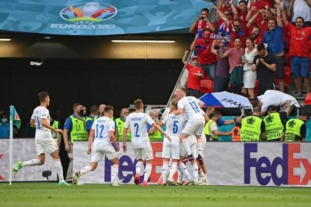 Czech Republic's players celebrate their first goal during the UEFA EURO 2020 round of 16 football match between the Netherlands and the Czech...