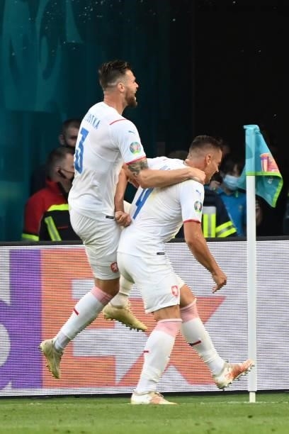 Czech Republic's midfielder Tomas Holes celebrates with Czech Republic's defender Ondrej Celustka after scoring his team's first goal during the UEFA...