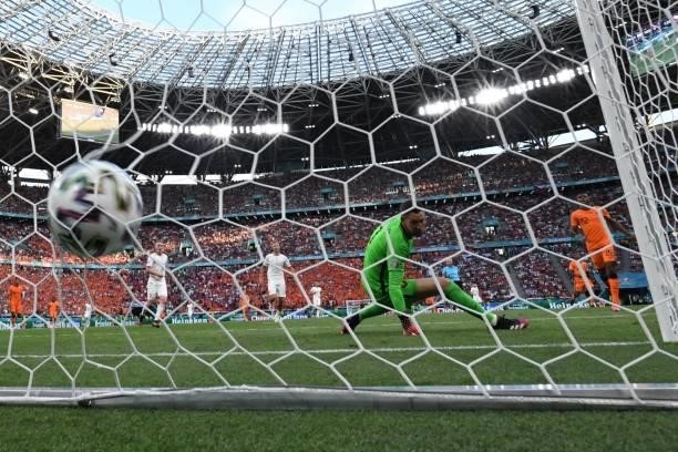 Netherlands' goalkeeper Maarten Stekelenburg concedes a second goal during the UEFA EURO 2020 round of 16 football match between the Netherlands and...
