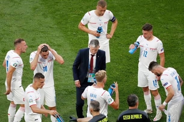 Czech Republic's coach Jaroslav Silhavy speaks with his players during the UEFA EURO 2020 round of 16 football match between the Netherlands and the...