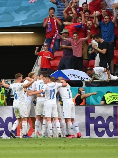 Czech Republic's players celebrate after scoring their first goal during the UEFA EURO 2020 round of 16 football match between the Netherlands and...