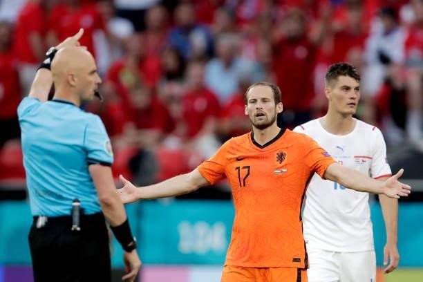 Referee Sergei Karasev, Daley Blind of Holland during the EURO match between Holland v Czech Republic at the Puskas Arena on June 27, 2021 in...