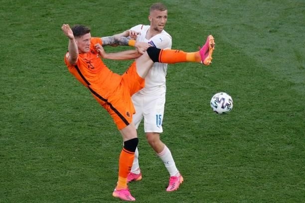 Netherlands' forward Wout Weghorst fights for the ball with Czech Republic's midfielder Tomas Soucek during the UEFA EURO 2020 round of 16 football...