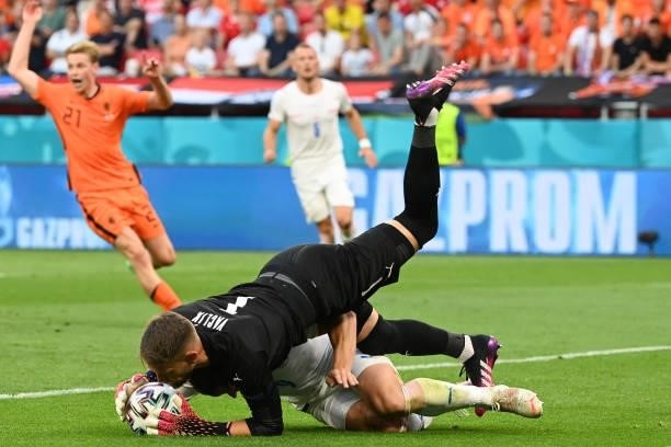 Czech Republic's goalkeeper Tomas Vaclik catches the ball during the UEFA EURO 2020 round of 16 football match between the Netherlands and the Czech...