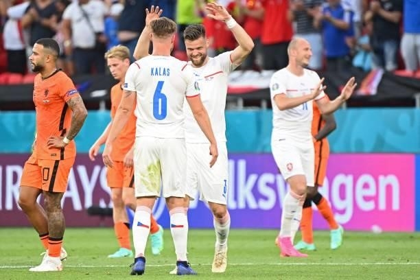 Czech Republic's defender Ondrej Celustka and Czech Republic's defender Tomas Kalas celebrate after winning the UEFA EURO 2020 round of 16 football...